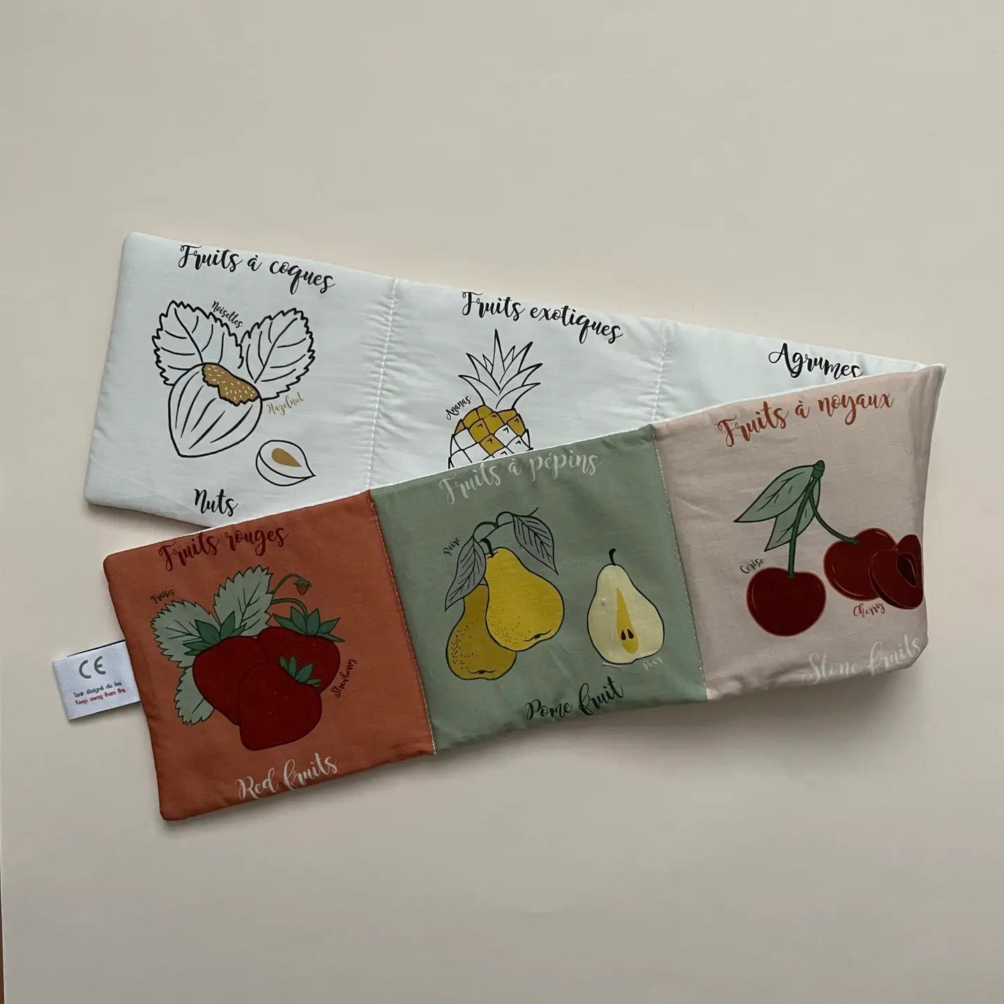 Livre d'éveil - familles de fruits Carotte & cie
