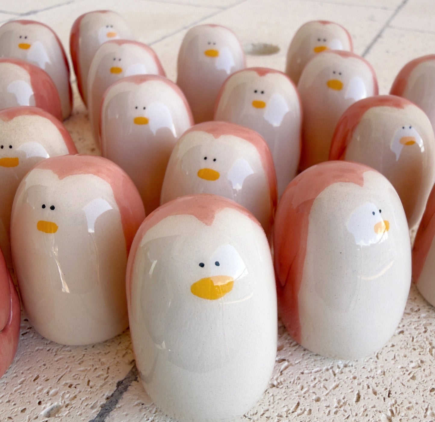 Amulette - Manchot de la présence